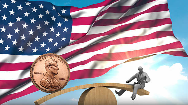 The poor investor is playing seesaw games with a single cent waving the US flag in the economic storm. But this is a dangerous game. / You can see the animation movie of this image from my iStock video portfolio. Video number: 2256128680