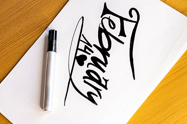 February 14th written on paper with a marker, symbolizing valentine's day