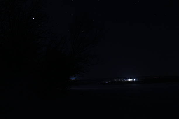 A body of water at night. Dark. Night. Night sky. 4000x3000. Abstract