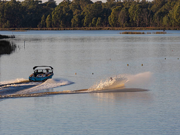 istock Early morning water skiing on lake 2256142582