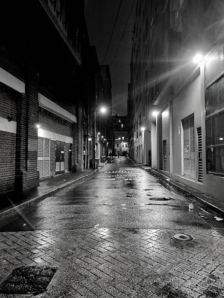 istock alleyway in black and white linear perspective 2256151609