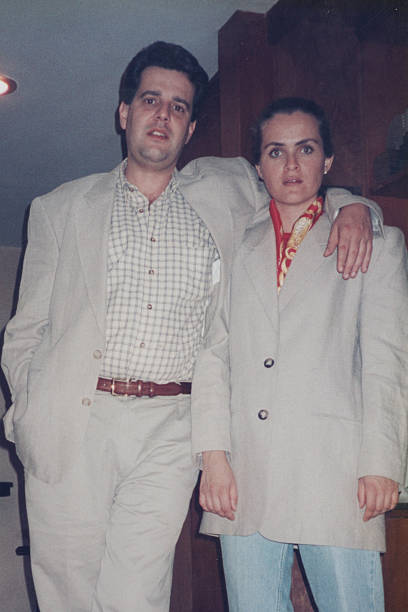 Image taken in 1980s: young couple looking at the camera
