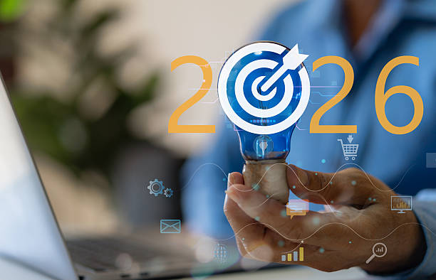 istock Businessman hold light bulb with target icon 2026, Concept for creative idea innovation, strategic vision, marketing goal setting and planning future business success objective, corporate development 2256153180