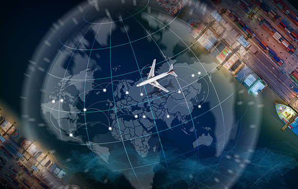 Aerial view and top view cargo plane flying above ship port coverage world map import-export business and logistics international goods. Shipping cargo to harbor by crane