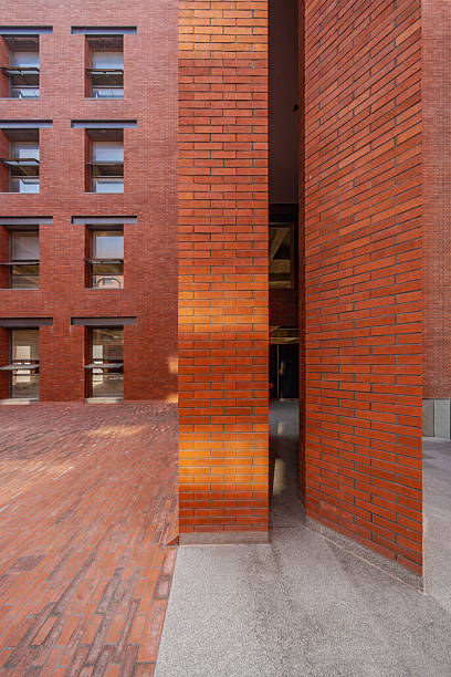 Partial exterior wall of red brick building