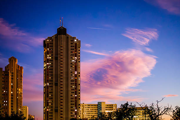 Illuminated Skyscrapers and Sunset Horizon in Benidorm, Valencian Community, Spain