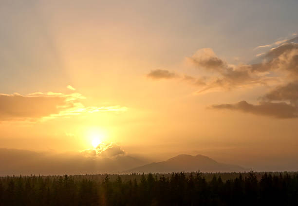 Scenic sunset in Southeast with forest and mountains