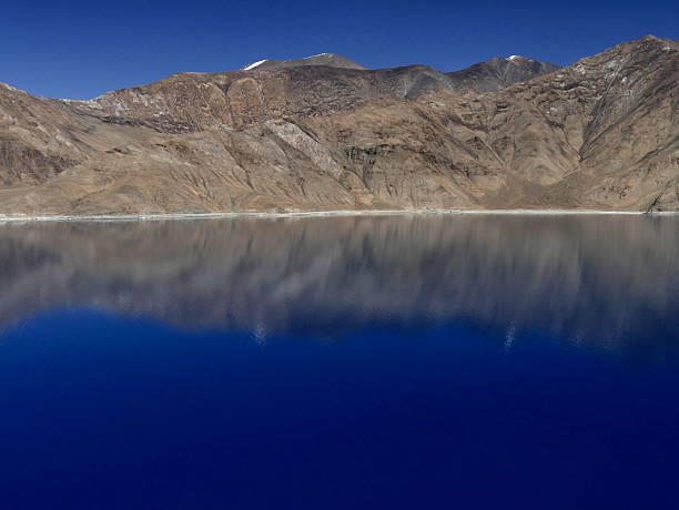 Beautiful landscape with mountains on the lake named Pagong Tso, or Pagong Lake, situated on the border with India and China, Leh, Ladakh, India. one of the world's highest brackish water lakes.