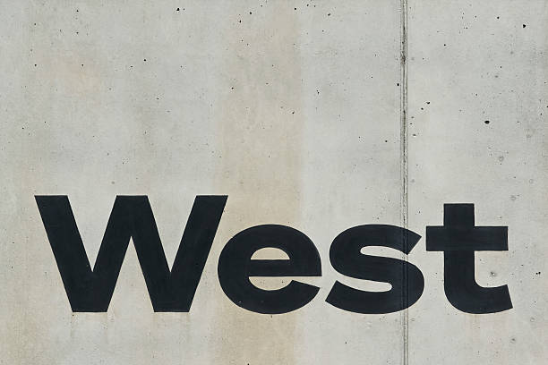 Concrete wall with the inscription West. West entrance to the beach in Bregenz.