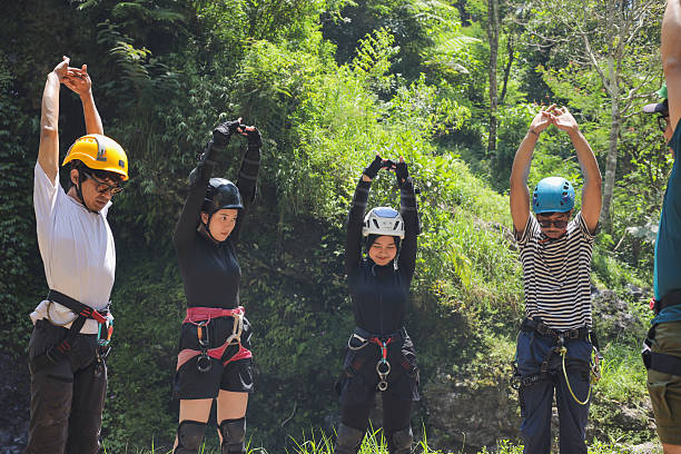 Stretching Arms Before Outdoor Extreme Sports