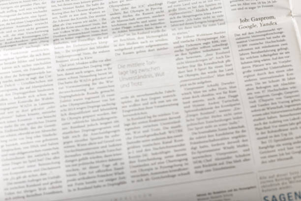 Printed news article shows several sections with text covering multiple topics of interest.