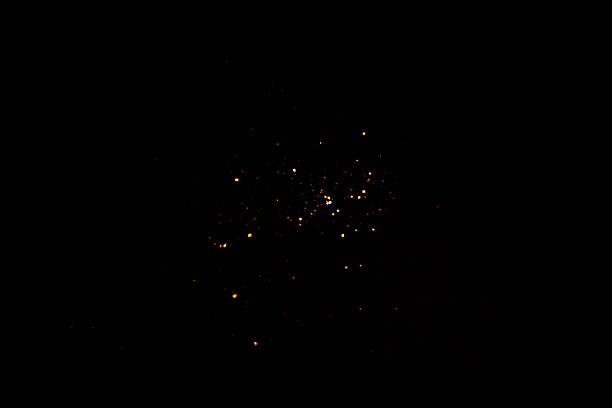 Golden abstract bokeh on black background. Holiday concept