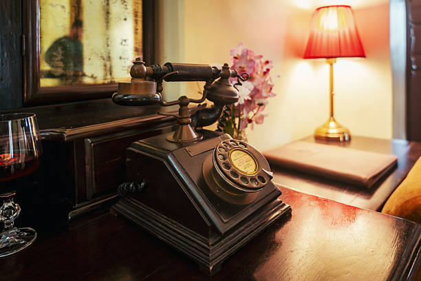 Vintage Rotary phone in a luxury hotel room.