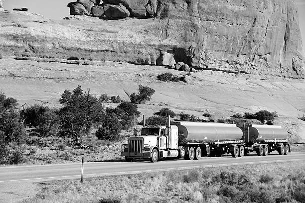 Tanker truck drives in rural Utah, United States. Trucking industry accounts for 69 percent of all freight transport in the USA.