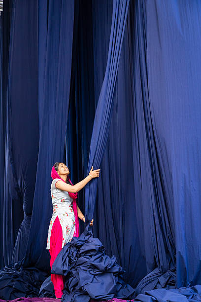 Small group of actors on stage during the performance