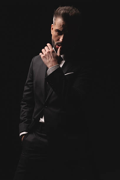istock Seductive man touching his lip with finger 2256220702