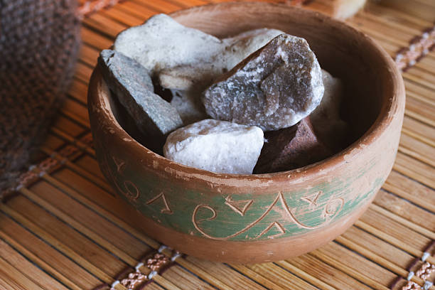 Bowl with stones creating a serene atmosphere for a spiritual ritual, isolated
