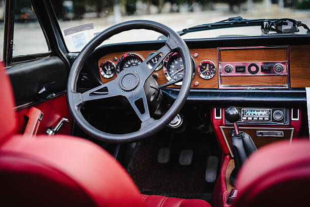 Interior detail of a classic car showcasing vintage materials and old-fashioned design. Automotive nostalgia concept suitable for retro lifestyle and transportation themes.