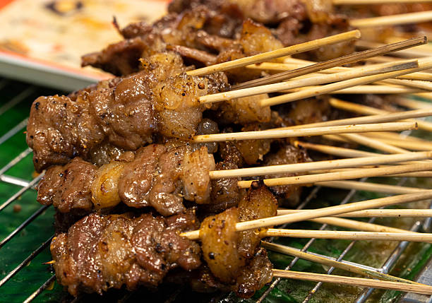 Grill skewers of delicious beef.