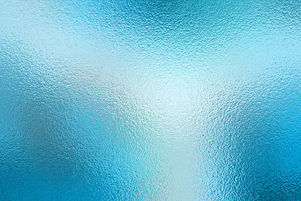 istock Blue Foil Texture Background with Glass Effect or sea blue glass texture 2256251367