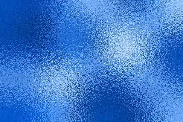 istock Blue Foil Texture Background with Glass Effect or sea blue glass texture 2256251836