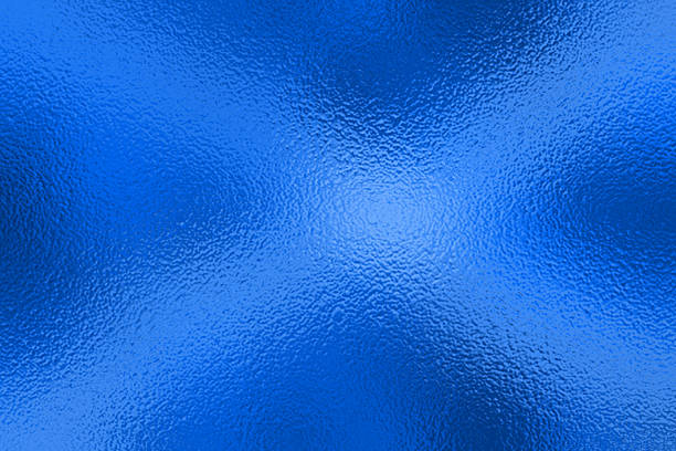 Blue Foil Texture Background with Glass Effect or sea blue glass texture. Blue Foil frosted Texture Background with Glass Effect, Illustration. Abstract gradient bright and shiny light reflection roug