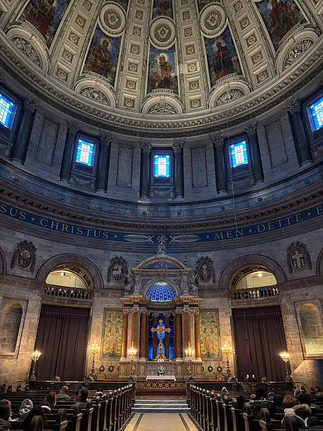 View of Frederik’s Church in Copenhagen, also known as the Marble Church, featuring its impressive dome and elegant neoclassical architecture. The historic landmark stands prominently against the sky, reflecting Denmark’s rich cultural heritage and architectural grandeur.