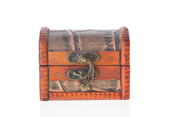 A wooden cabinet with three drawers and a black handle. The cabinet is made of wood and has a rustic look