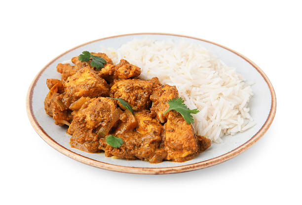 istock Delicious chicken curry with rice isolated on white 2256273010