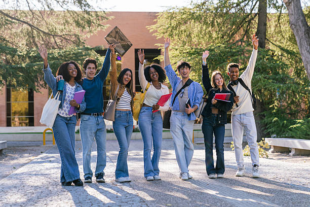 istock Multiracial students celebrating friendship and education on campus 2256285842
