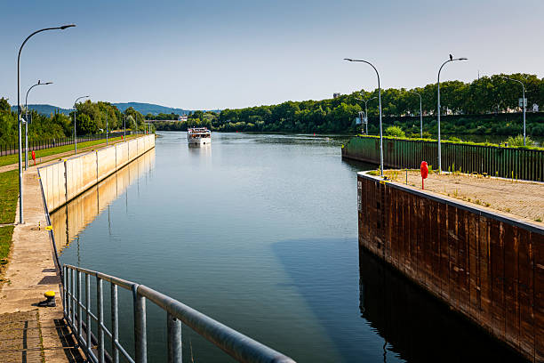 sightseeing boat near a canal lock