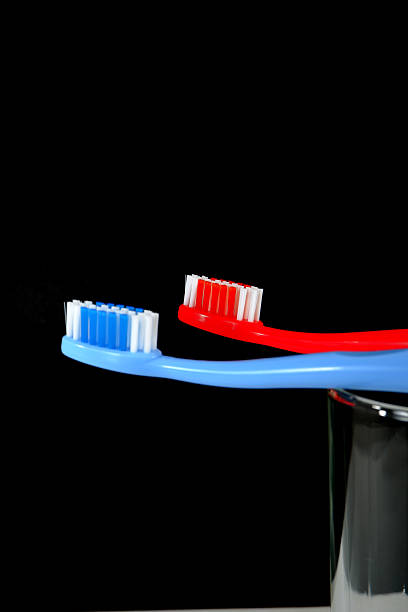 Toothpaste and electric toothbrush macrophotography