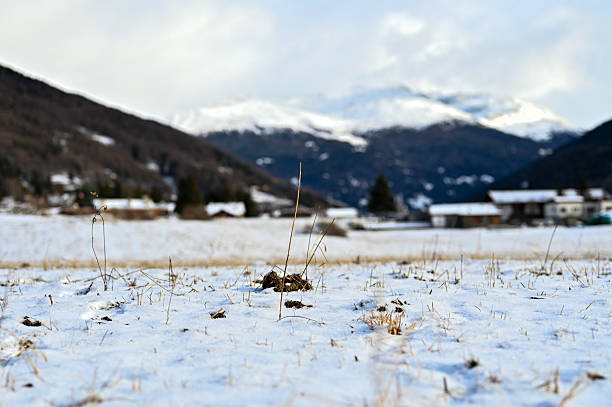 View of Mount Giewont and the Tatra Mountains in winter. Mountain landscape from the side of the village of Koscielisko . High quality photo