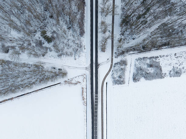 istock Aerial winter road intersection in snowy landscape 2256304601