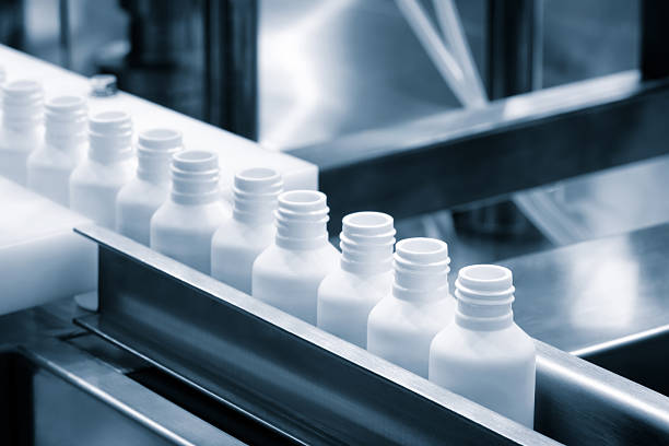 istock White plastic bottles for medicines and vaccines in a pharmaceutical factory 2256313048