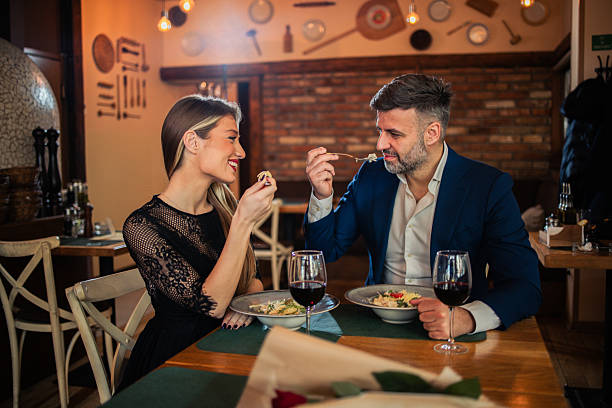 istock Couple in love enjoying a romantic dinner at the restaurant 2256320878