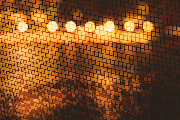 orange yellow light bokeh with golden mosaic wall for retro party background