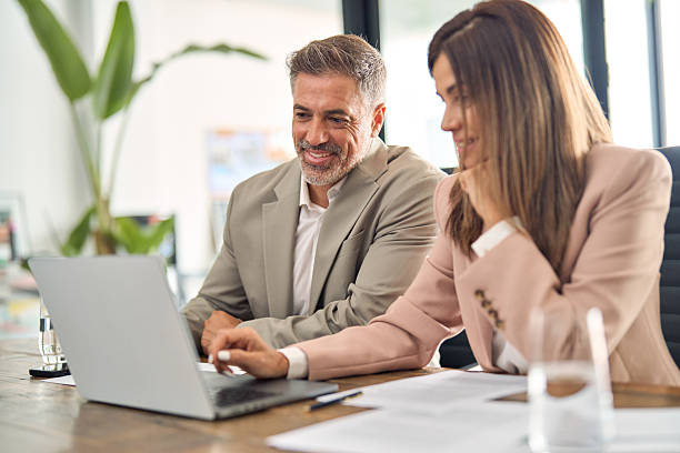 istock Professional business executives office team working using laptop at meeting. 2256328857