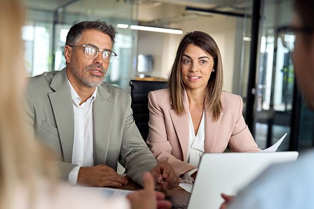 istock International professional executives group working at team meeting in office. 2256328874
