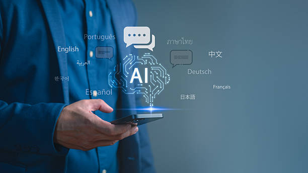 istock Man holding smartphone with glowing AI icon and multiple world languages, representing artificial intelligence translation, global communication, multilingual technology, and digital innovation. 2256343696