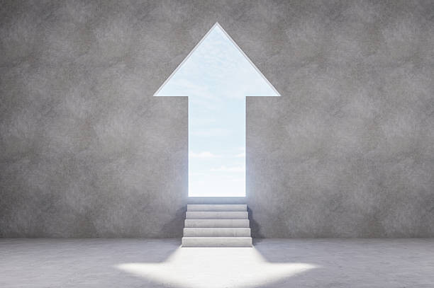 Minimal concrete interior with stairs leading to bright doorway and soft daylight, abstract architectural space symbolizing hope, freedom and new beginning, 3d rendering
