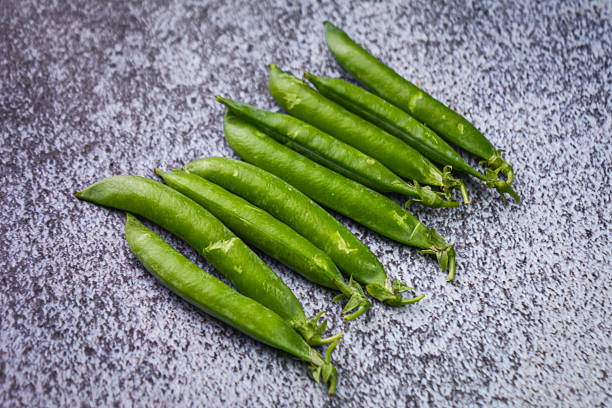 Organic green peas in pods