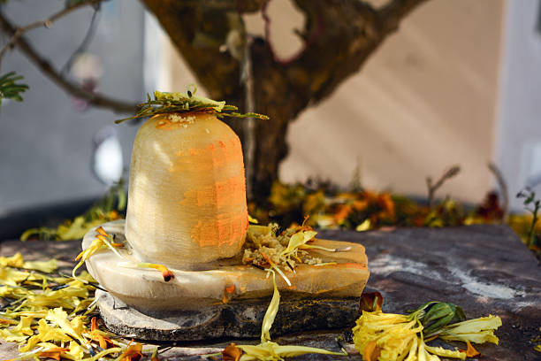 Sacred shivling with flowers during hindu worship