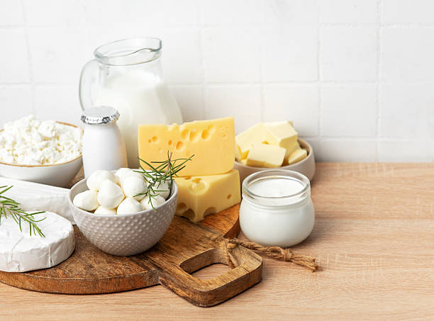 Various healthy milk products like cheese, butter, ricotta, mozzarella, and milk