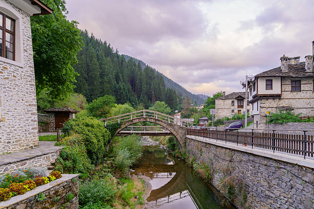 Sunrise view of a street with typical buildings, in Shiroka Laka, Rhodope Mountains, southern Bulgaria