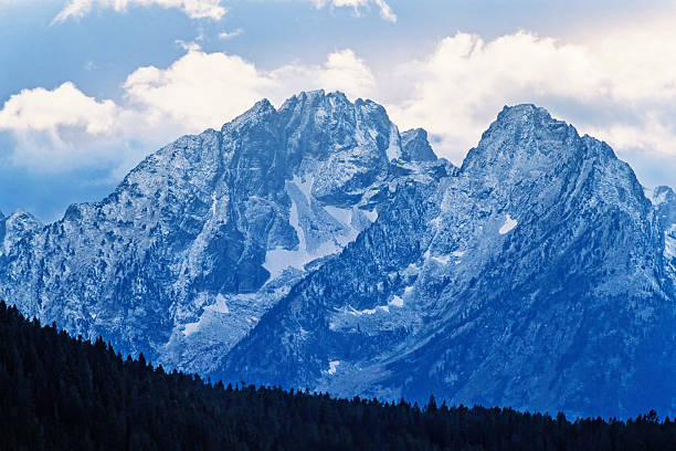 Mountain peak with new snow in a dramatic landscape view