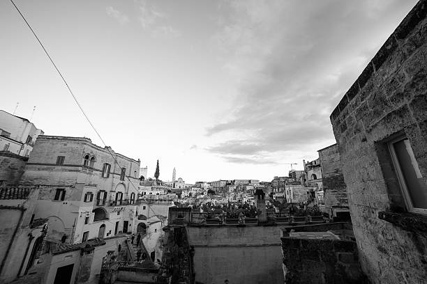 Matera, SassiDiMatera, VisitMatera, Basilicata, VisitBasilicata, Sassi, MateraItaly, UNESCOWorldHeritage, AncientCity, CaveCity, NoTimeToDie, JamesBondLocation, CinematicPhotography, HistoricItaly, AncientArchitecture, StoneCity, OldWorld, TimelessItaly, MateraAtNight, GoldenHour, SunsetPhotography, MateraSassi, MagicalItaly, NightPhotography, CityLights