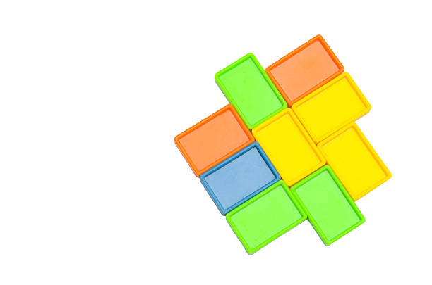 Vibrant Rectangular Plastic Game Tiles in Loose and Connected Arrangement, Toy and Puzzle Concept