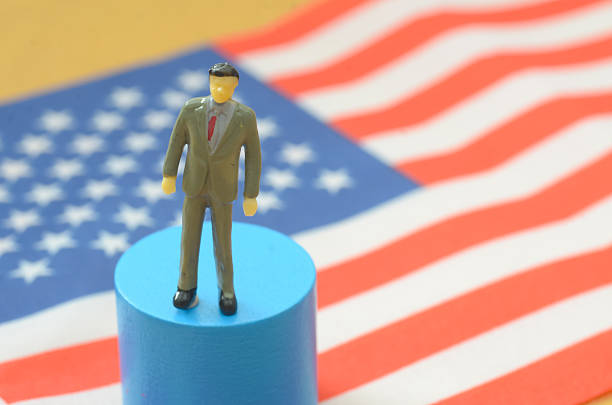 Close-up of a dark-skinned politician's hand pointing up during the speech, we don't  see a man, only his hand in the foreground