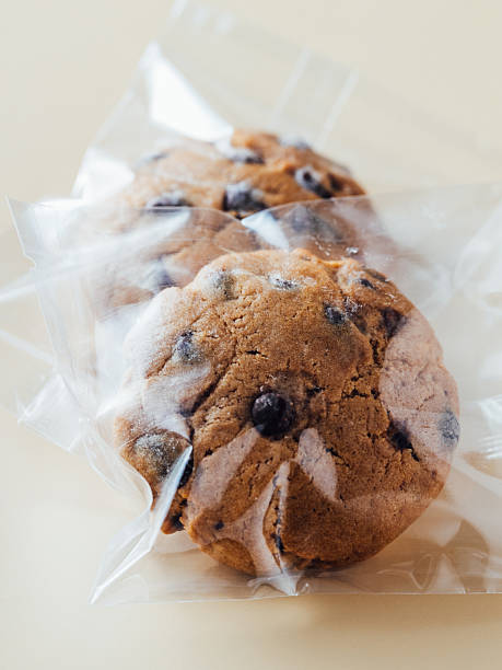 Freshly Baked Cookies Inside Clear Plastic Packaging on Light Background